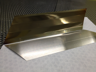 Roller-embossing shims, front- and backside